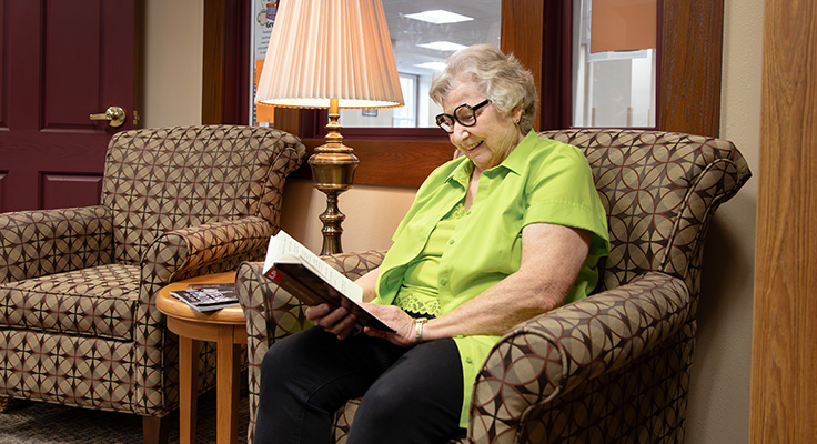 A woman reads in the library